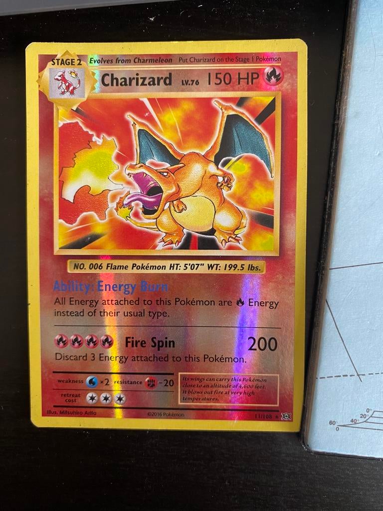 Charizard 11/108 2016 reverse holo, Hobby en Vrije tijd, Verzamelkaartspellen | Pokémon, Ophalen of Verzenden, Zo goed als nieuw