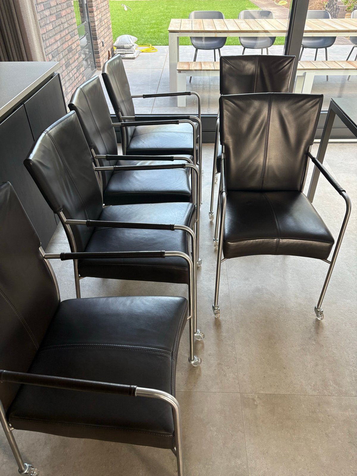 6 leren stoelen van Bert Plantagie met wieltjes, Ophalen, Gebruikt, Zwart, Leer