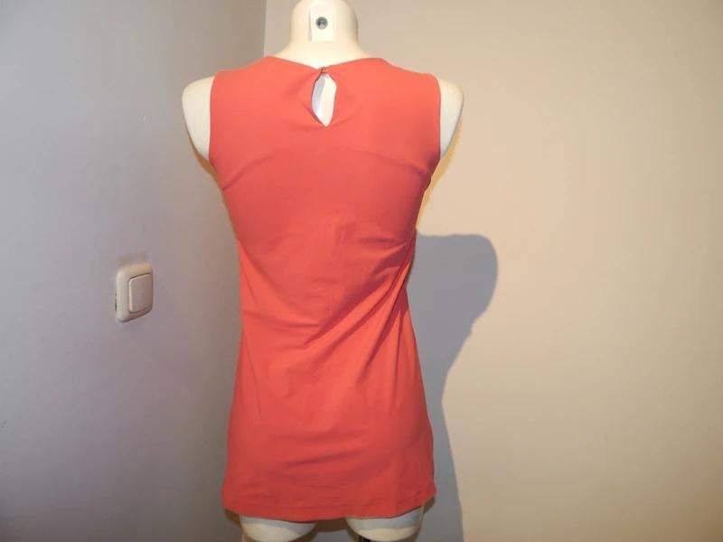 Ladress koraal kleurige stretch top iets langer model XS, Overige kleuren, Verzenden, Zo goed als nieuw, Zonder mouw