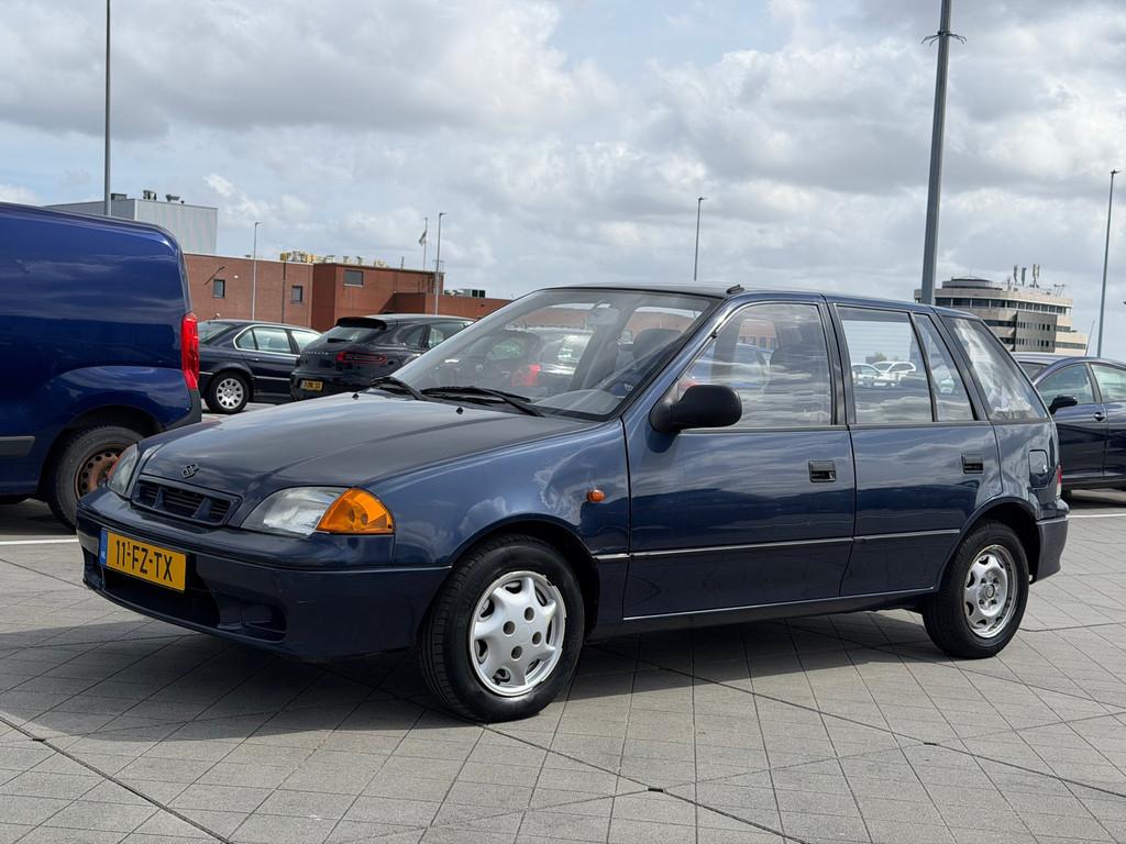 Suzuki Swift 1.3 GLX AUTOMAAT AIRCO Nieuwe Apk Goed Onderhou, Auto's, Gebruikt, 4 cilinders, Blauw, Bedrijf