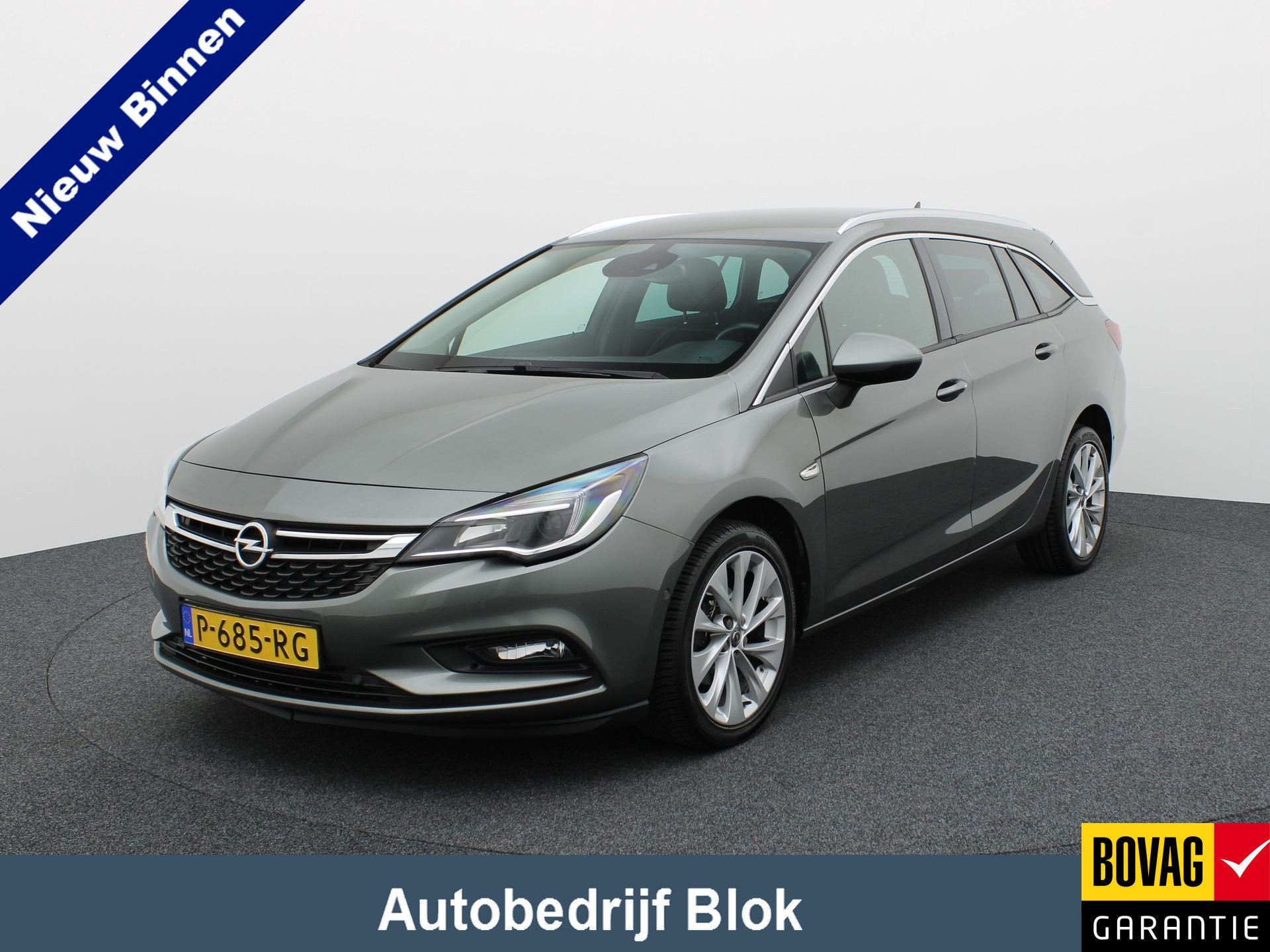 Opel Astra Sports Tourer 1.4 Turbo Innovation | Trekhaak | E, Auto's, Opel, Voorwielaandrijving, 12 maanden, Gebruikt, Leder en Stof