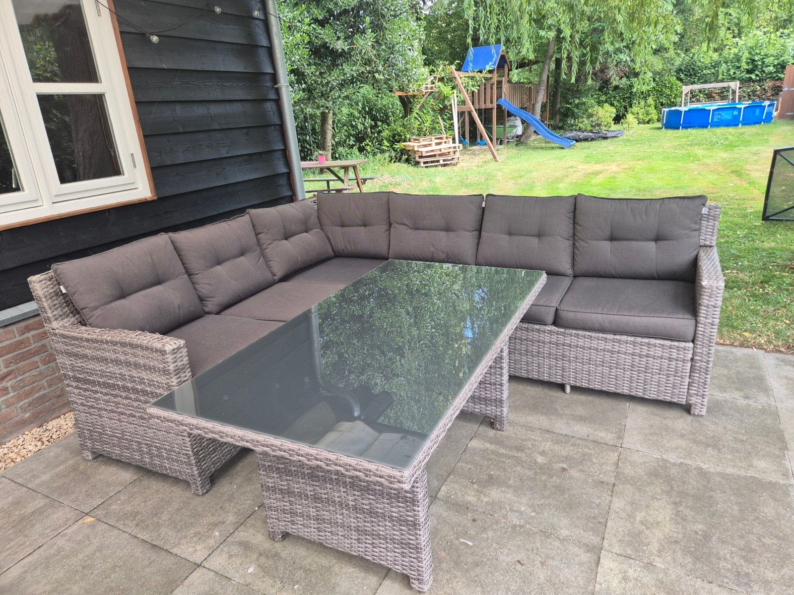 Tuinset met hoekbank en glazen tafel, Ophalen, Gebruikt, 6 zitplaatsen, Loungeset