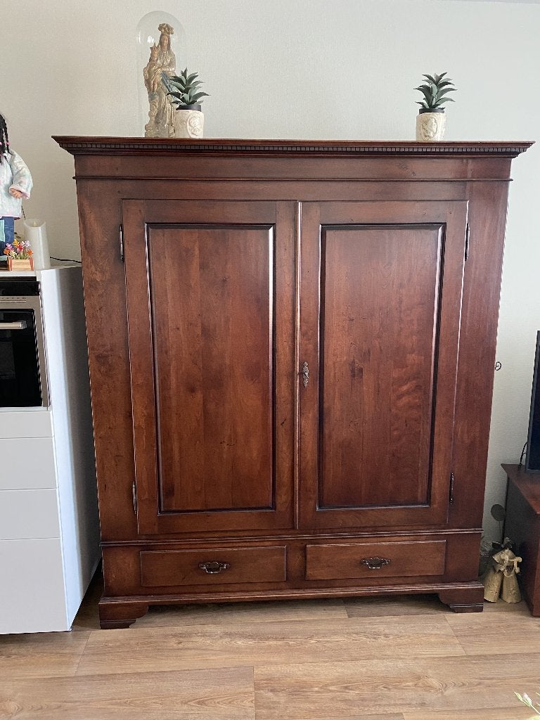Massief houten kast, Ophalen