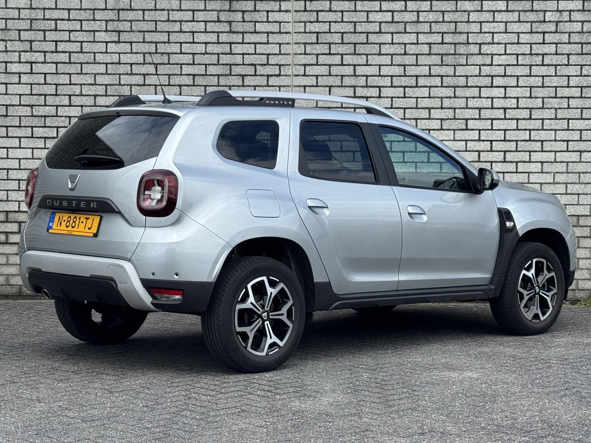 Dacia Duster 1.0 TCe Prestige | Achteruitrijcamera | Navigat, Stof, Gebruikt, 1200 kg, Verwarmde buitenspiegels