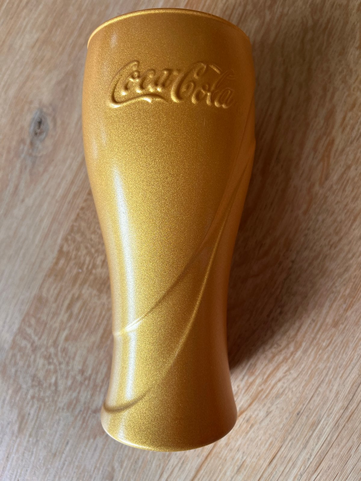 Gouden Coca-Cola glas, Huis en Inrichting, Goud, Ophalen of Verzenden, Zo goed als nieuw, Overige merken