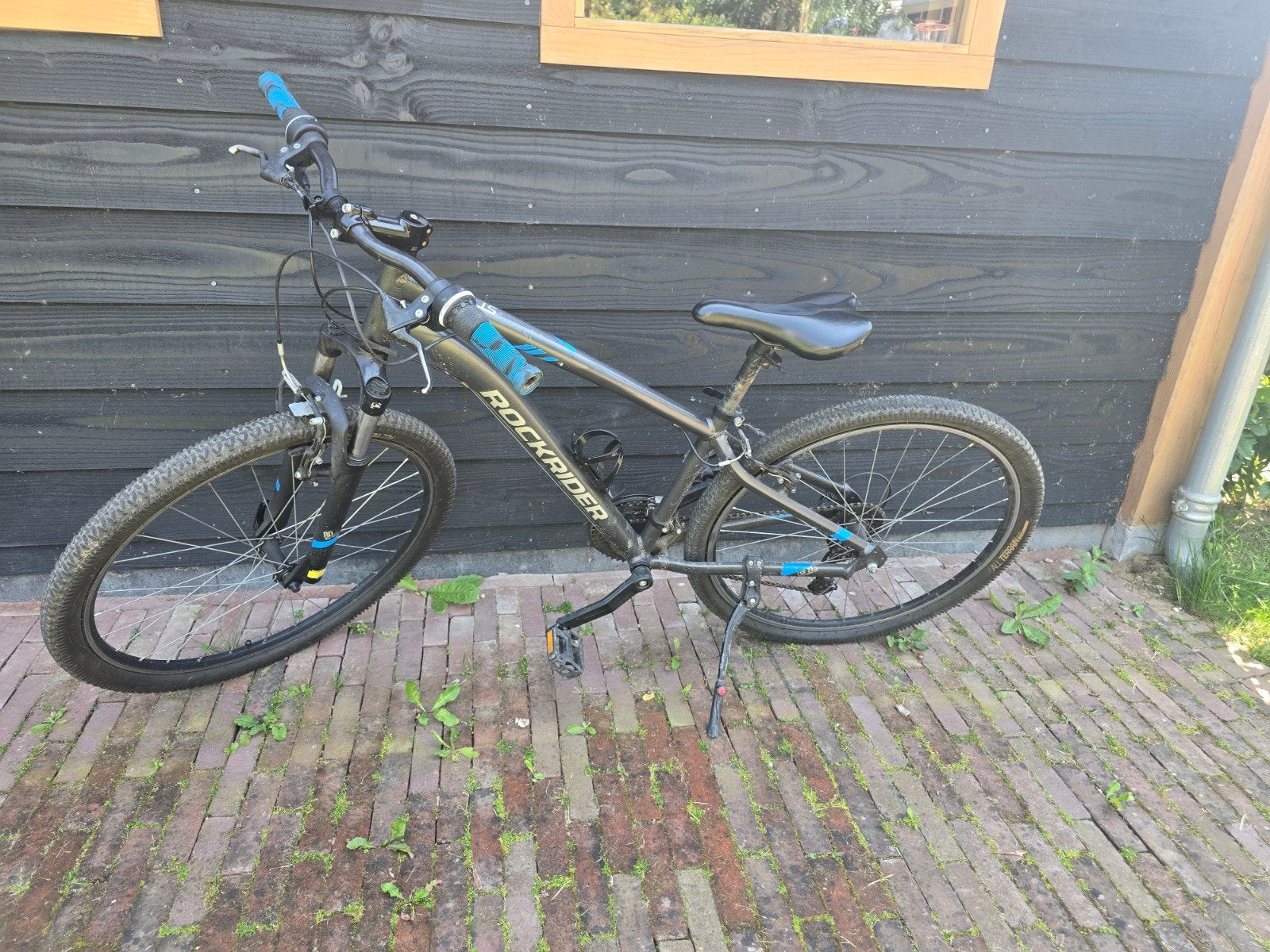 Rockrider fiets met nieuwe buitenbanden, Ophalen