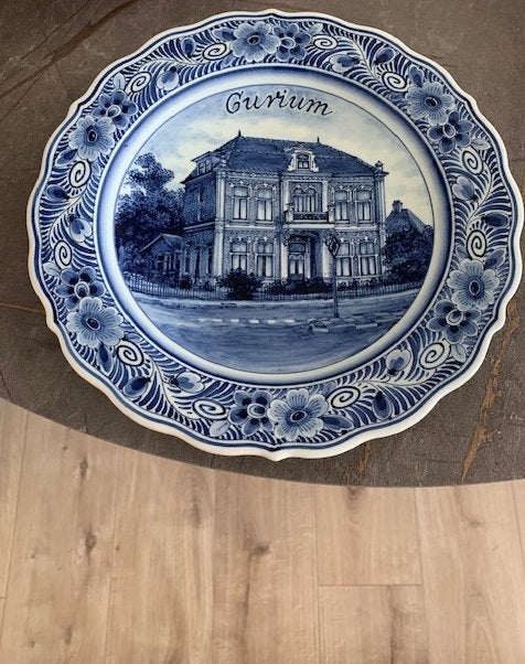 Delfts blauw bord van Curium Oegstgeest, Antiek en Kunst, Antiek | Keramiek en Aardewerk, Ophalen of Verzenden