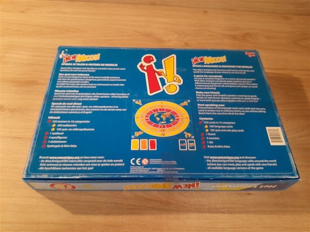New Amigos - Het talenspel - Engels - Nederlands - s5864, Hobby en Vrije tijd, Gezelschapsspellen | Bordspellen, Verzenden, Zo goed als nieuw