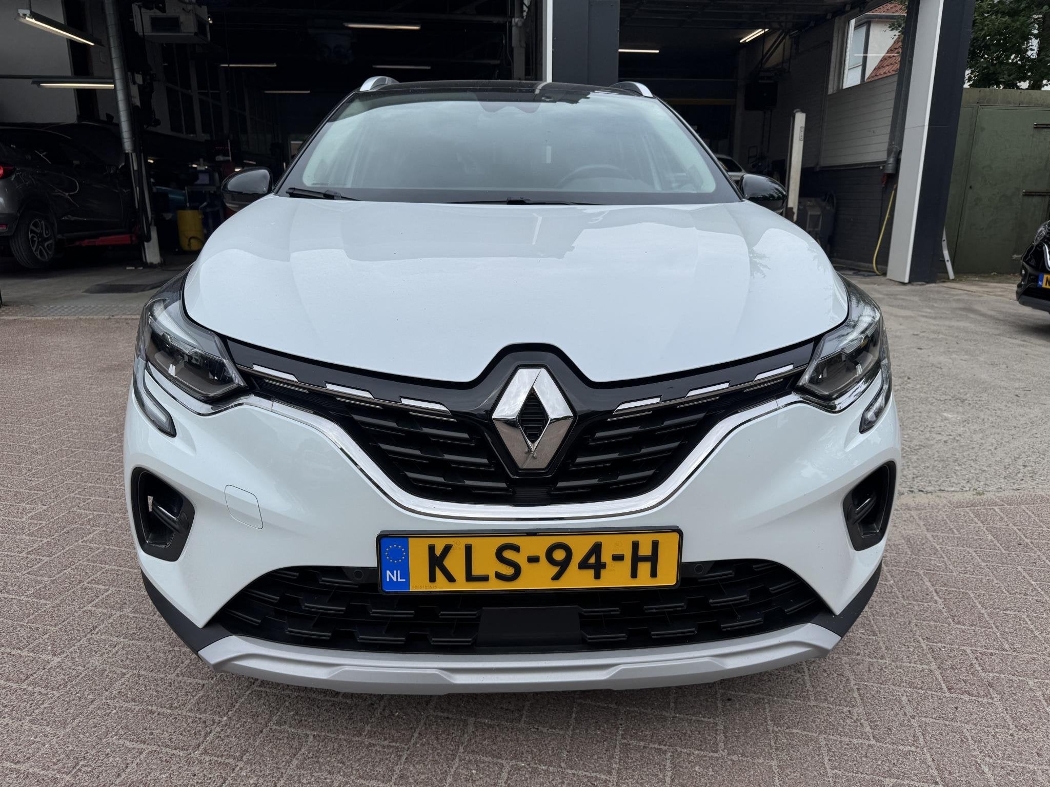 Renault Captur 1.3 TCe 140pk EDC Intens+Pack Winter!, Gebruikt, 4 cilinders, Leder en Stof, Wit