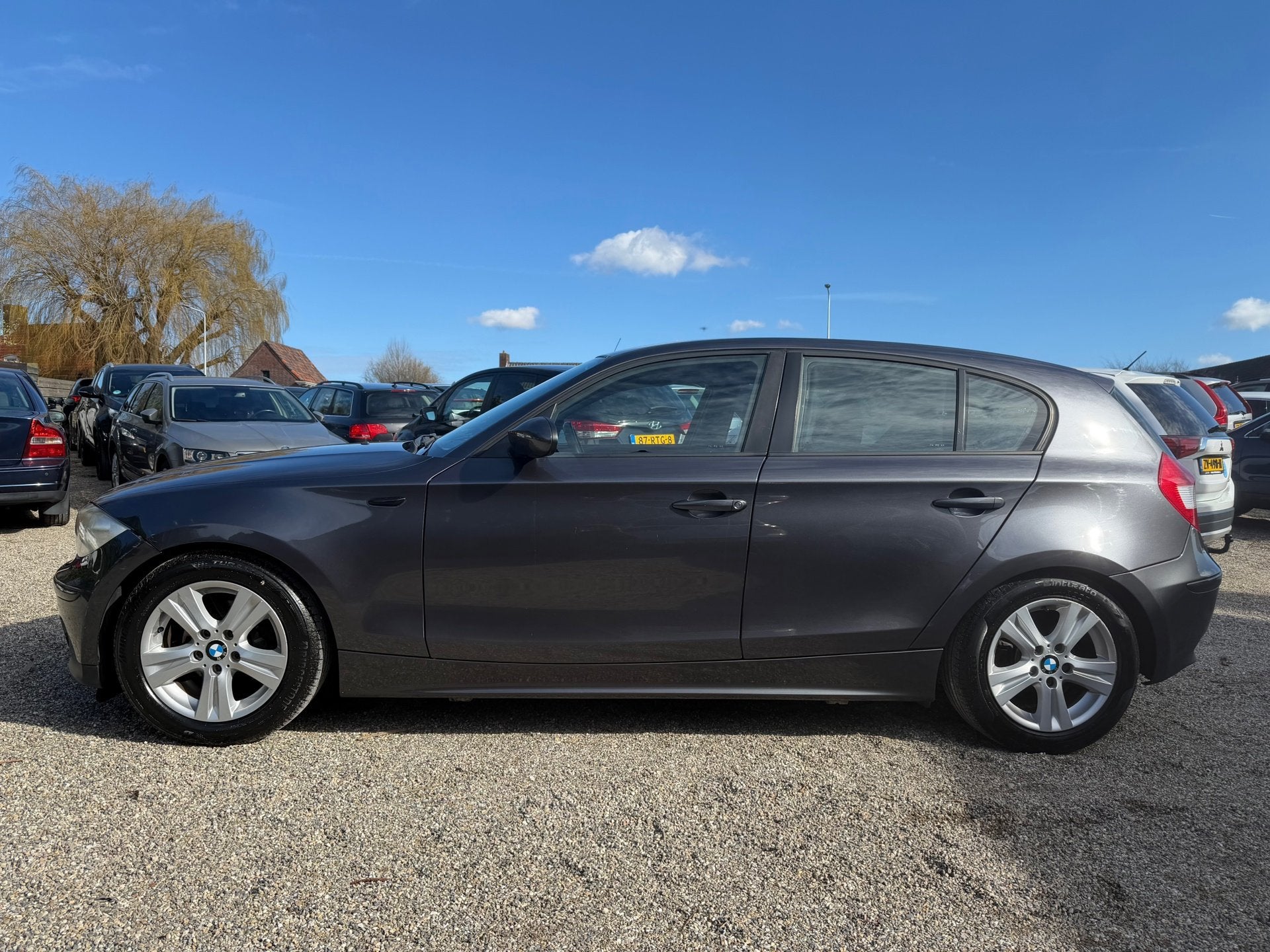 BMW 1-serie 116i High Executive Airco Cruise PDC LMV Nieuwe, Auto's, BMW, 1596 cc, Gebruikt, 4 cilinders, 635 kg