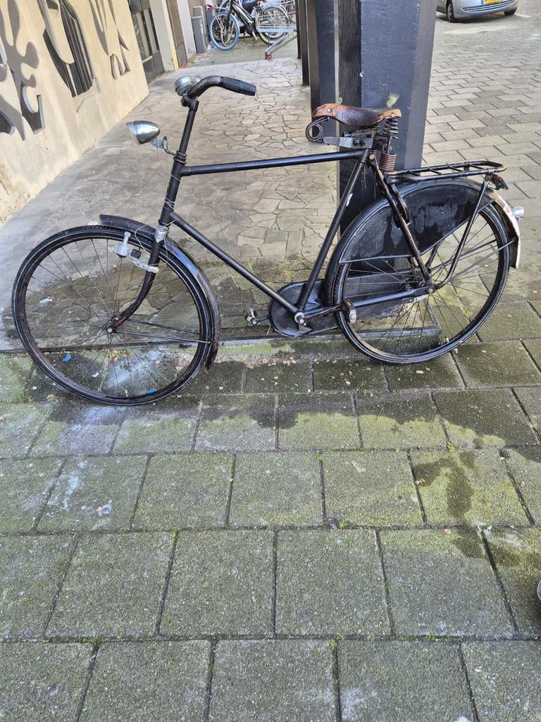 Oude herenfiets, Ophalen