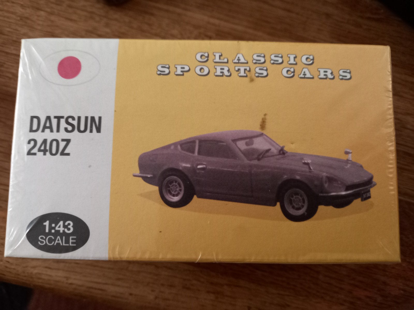 Rode Datsun 240Z modelauto - Nieuw in ongeopende verpakking, Hobby en Vrije tijd, Modelauto's | 1:43, Ophalen of Verzenden