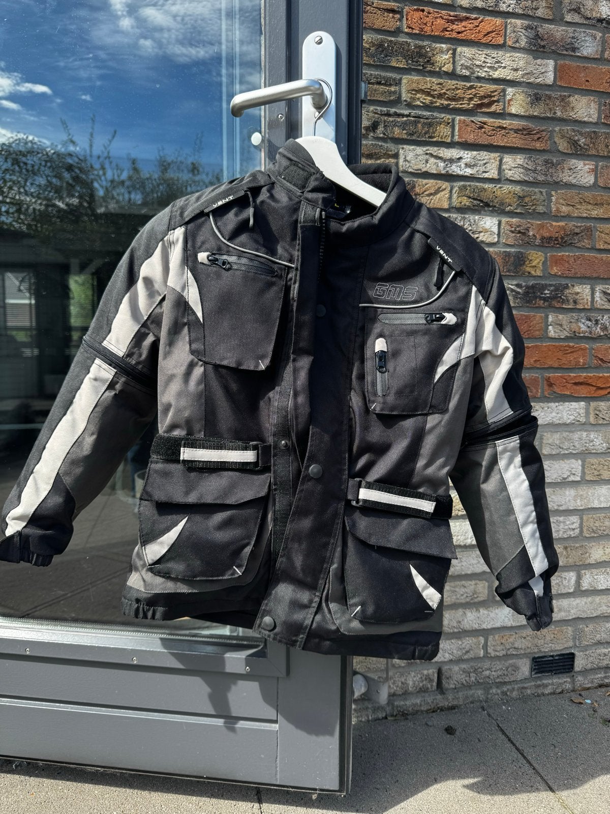 GMS Kinder Motorjas met Verstelbare Mouwen, Ophalen of Verzenden, Zo goed als nieuw, Maat 42/44 (L), Zwart