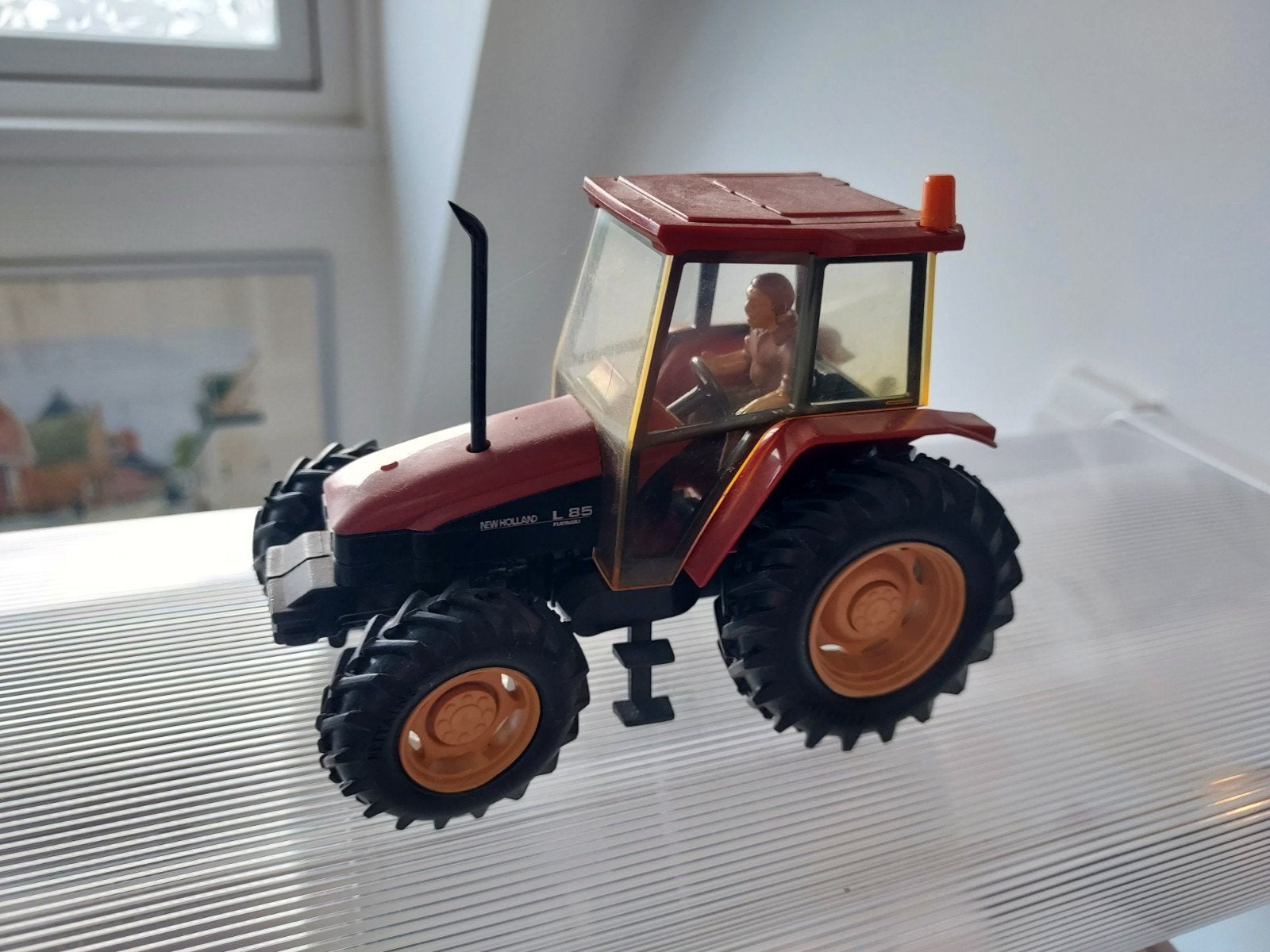 New Holland L85 Speelgoed Tractor - Zo goed als nieuw, Ophalen of Verzenden, Gebruikt