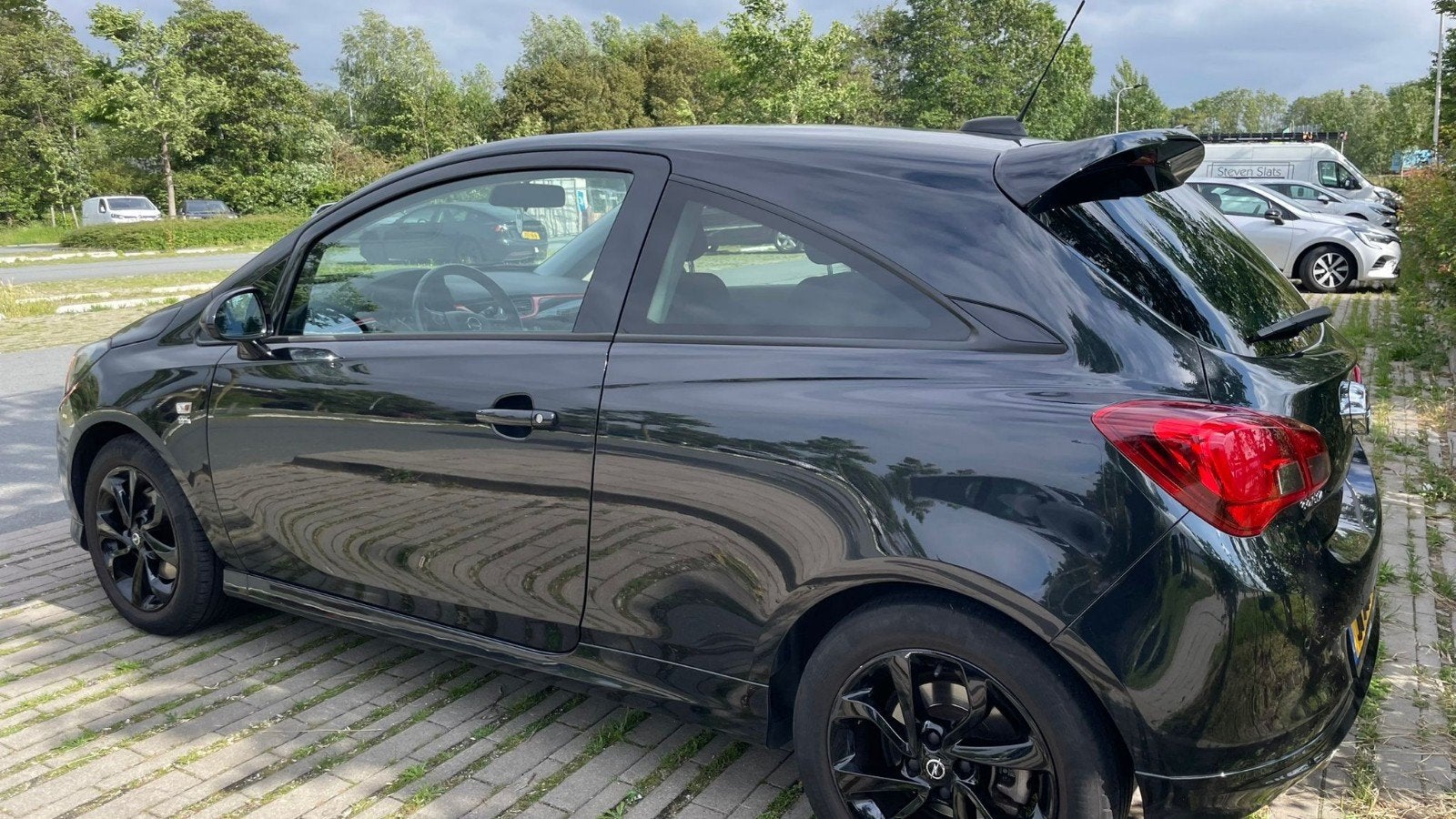 Zo goed als nieuwe sportieve Opel Corsa OPC line 1.0 (2016), Auto's, Opel, Voorwielaandrijving, Stuurwielverwarming, Zwart, Origineel Nederlands