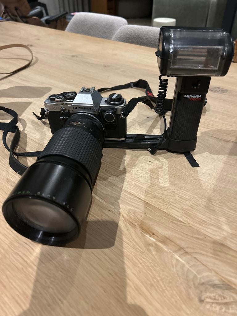 Olympus OM10 Spiegelreflexcamera met Miranda 100CB flitser, Ophalen of Verzenden, Gebruikt, Spiegelreflex, Olympus