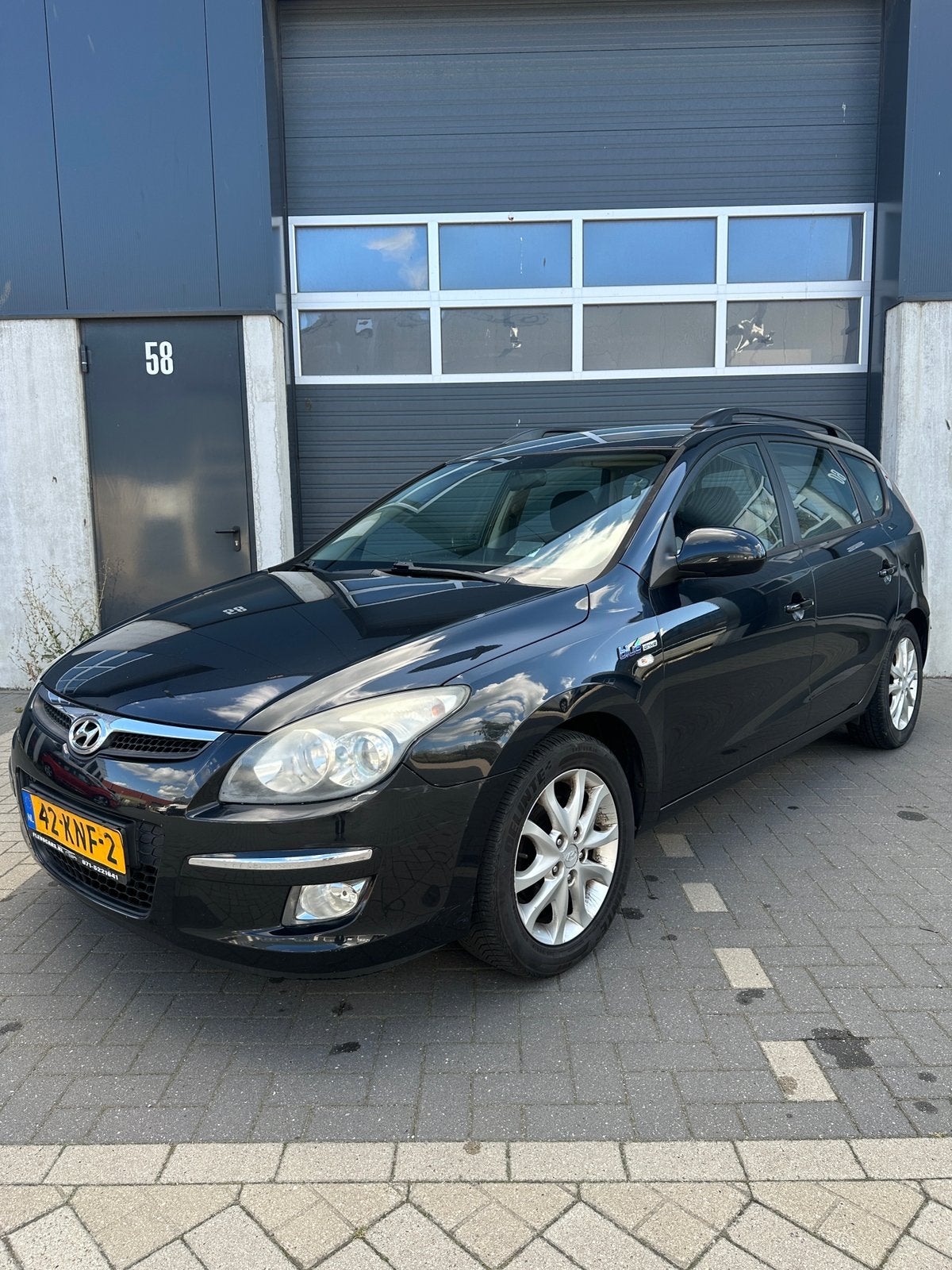 Hyundai i30 1.4i Cvvt 109pk Blue 2010 Zwart, Auto's, Voorwielaandrijving, Euro 5, Stof, Zwart