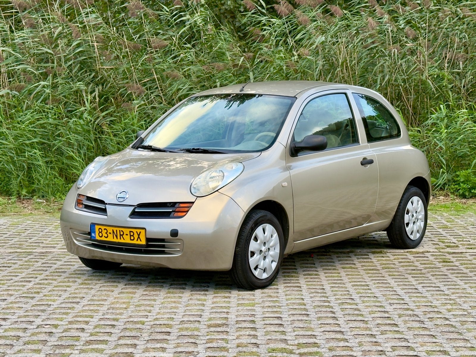 Nissan Micra 1.2 Automaat | Airco | NAP | Elektrische ramen, 15 km/l, 31 €/maand, 4 cilinders, Beige