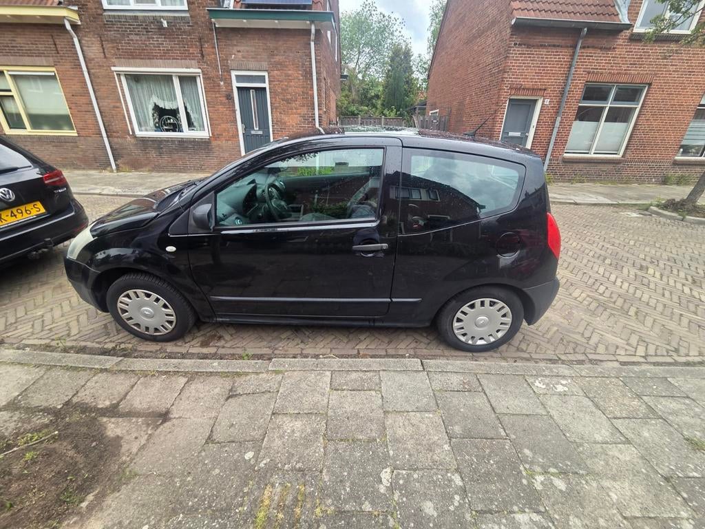 Citroën C2 1.1 I 2004 Zwart, Auto's, Voorwielaandrijving, 450 kg, 525 kg, 31 €/maand