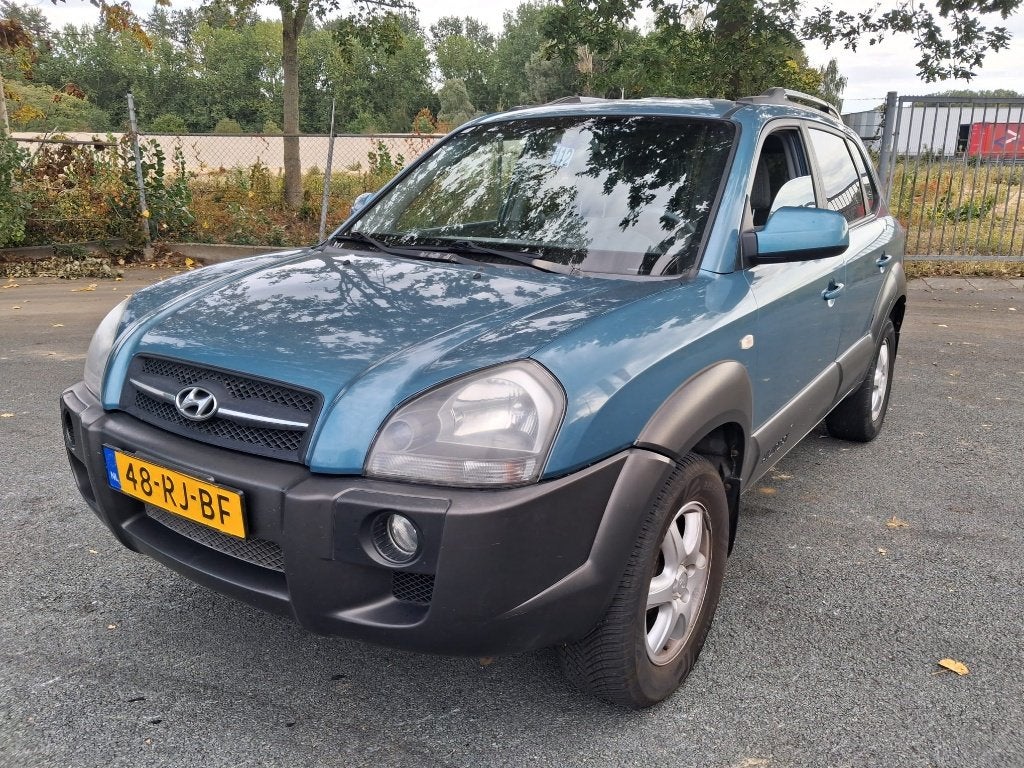 Hyundai Tucson 2.0 I 2WD 2005 Blauw, Auto's, Stof, 4 cilinders, Blauw, Origineel Nederlands