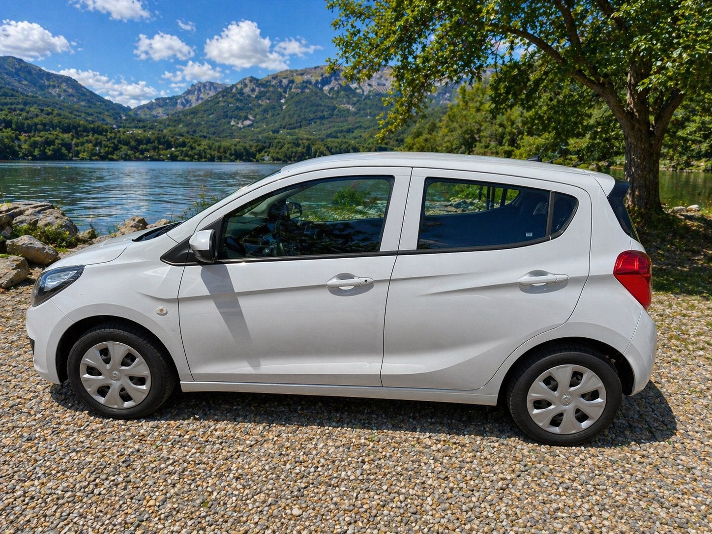 Opel Karl 1.0 Ecoflex 55KW 2017 Wit, Auto's, Voorwielaandrijving, 839 kg, Stof, 74 pk