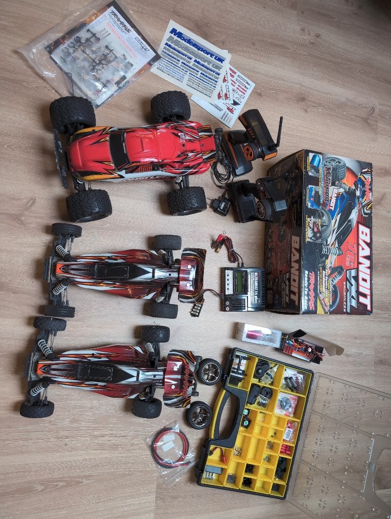 Traxxas Rustler en Bandit + lader en spareparts, Gebruikt, Auto offroad, Schaal 1:10, Ophalen