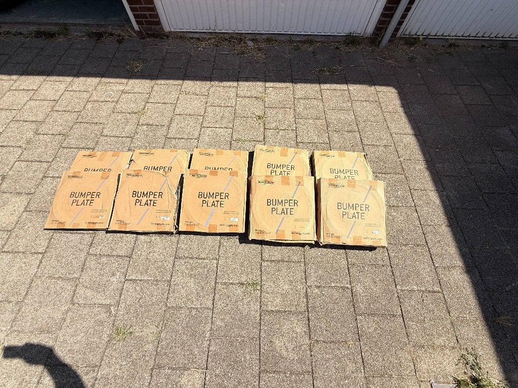 Nieuw in doos 150 kg: Technogym BumperPlate Sets, Ophalen, Nieuw, Benen, Halterschijven