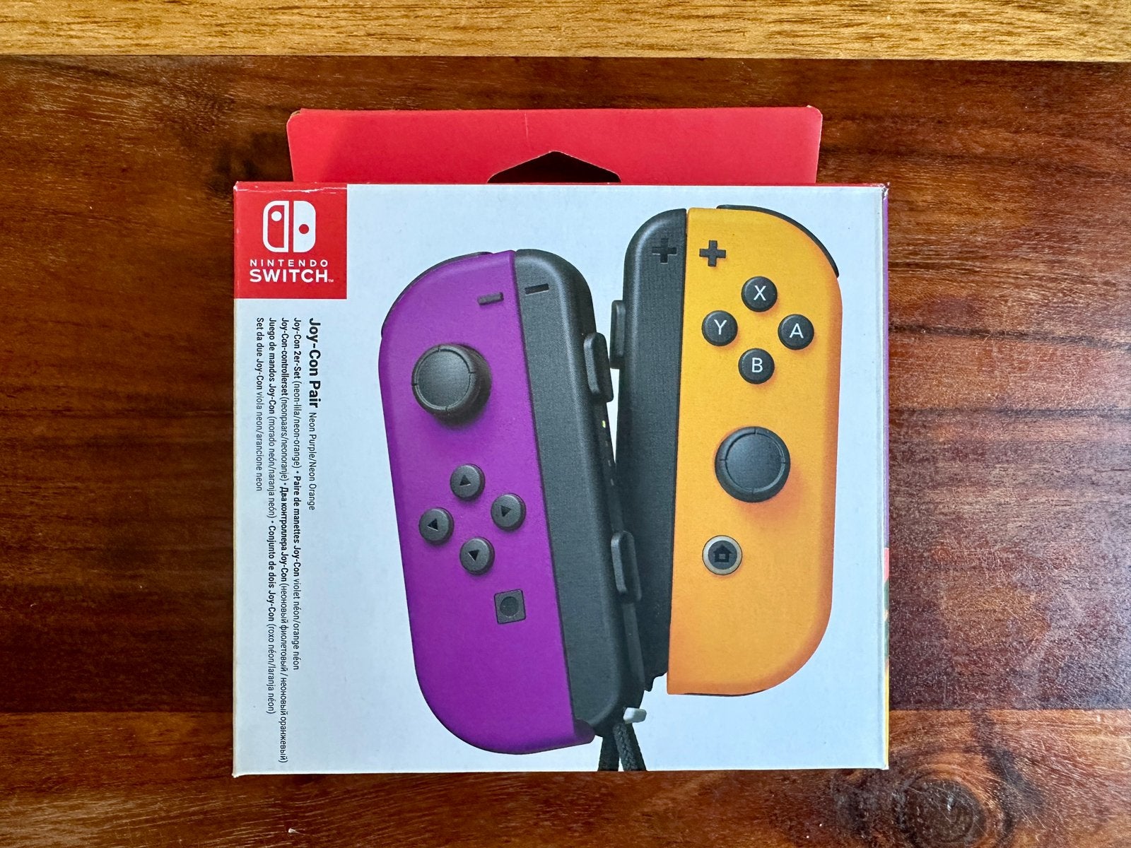 NIEUW Nintendo Switch Joy-Con set Neon Paars/Neon Oranje, Ophalen of Verzenden, Nieuw, Switch, Overige controllers