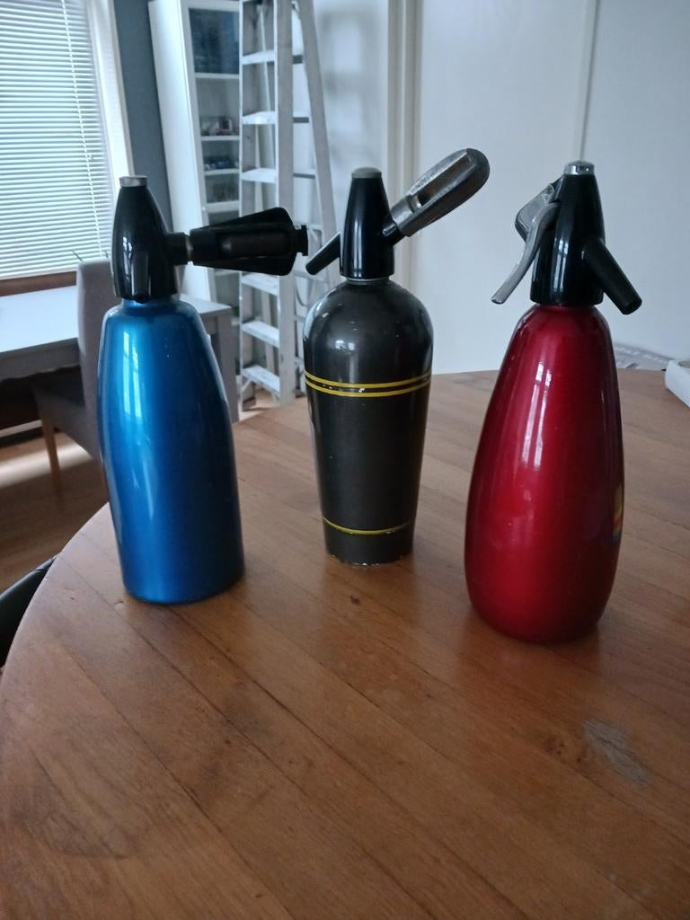 3 spuitflessen, Ophalen