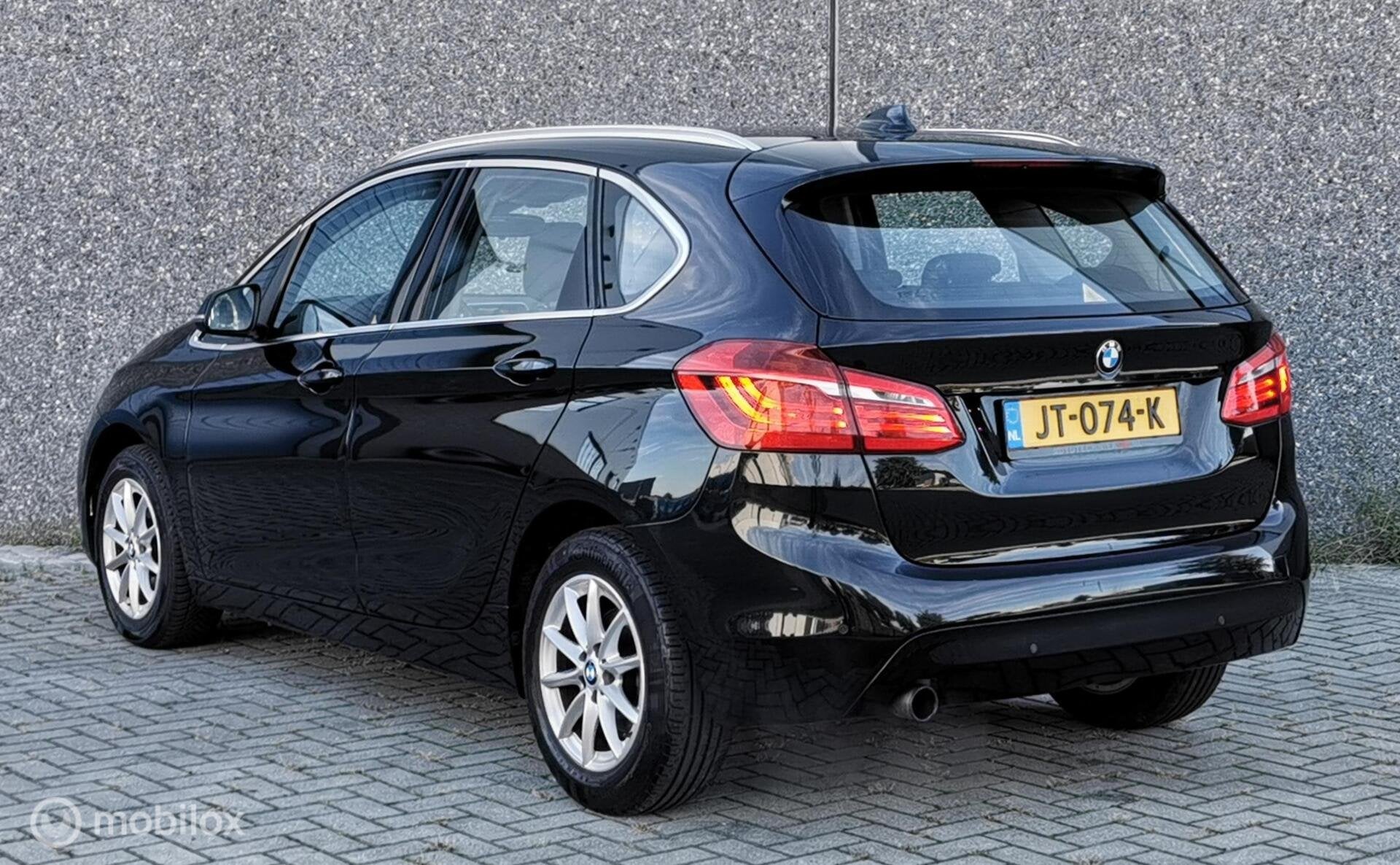 BMW 2-SERIE ACTIVE TOURER 216i 102PK/NAP/NAVI/LED/PDC/CRUISE, Auto's, Voorwielaandrijving, Stof, Zwart, Bedrijf