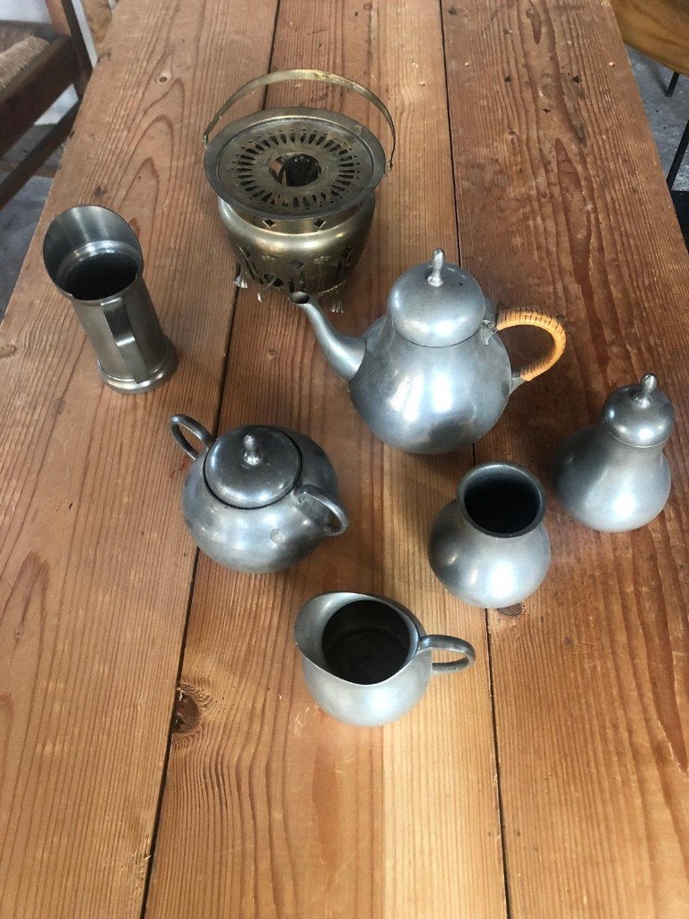 Tinnen thee servies, Ophalen