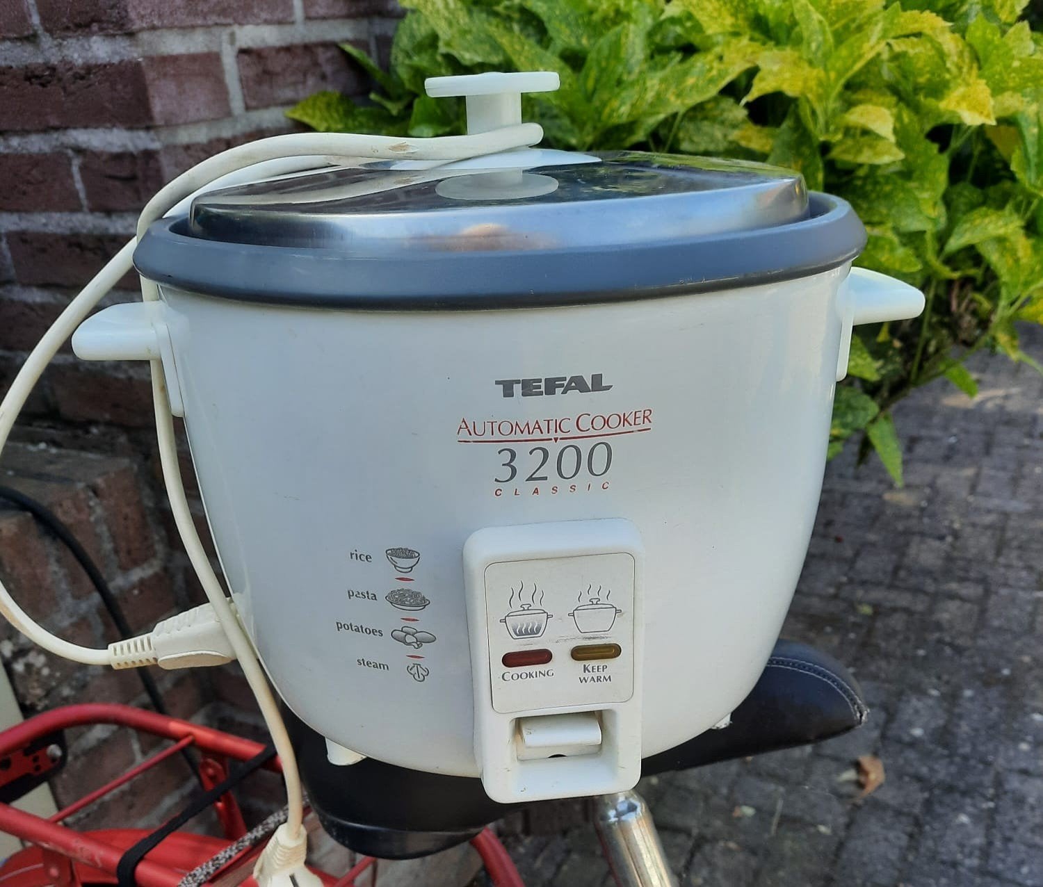 Rijstkoker, Ophalen