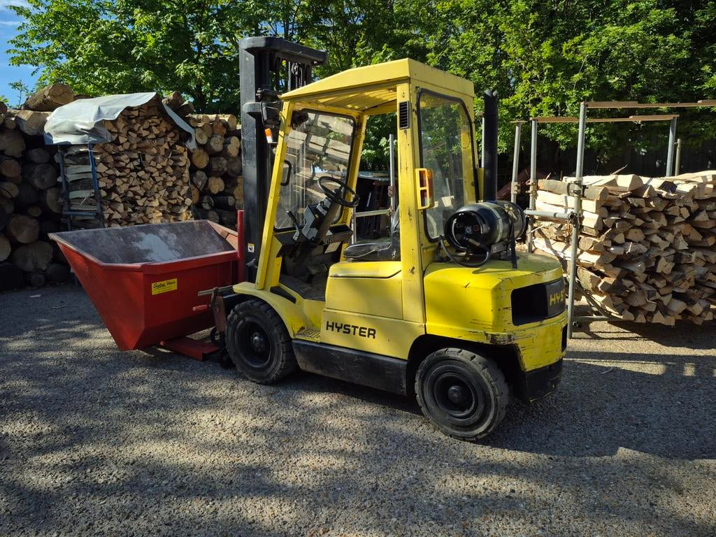 Grote schepbak kiepbak heftruck, Ophalen