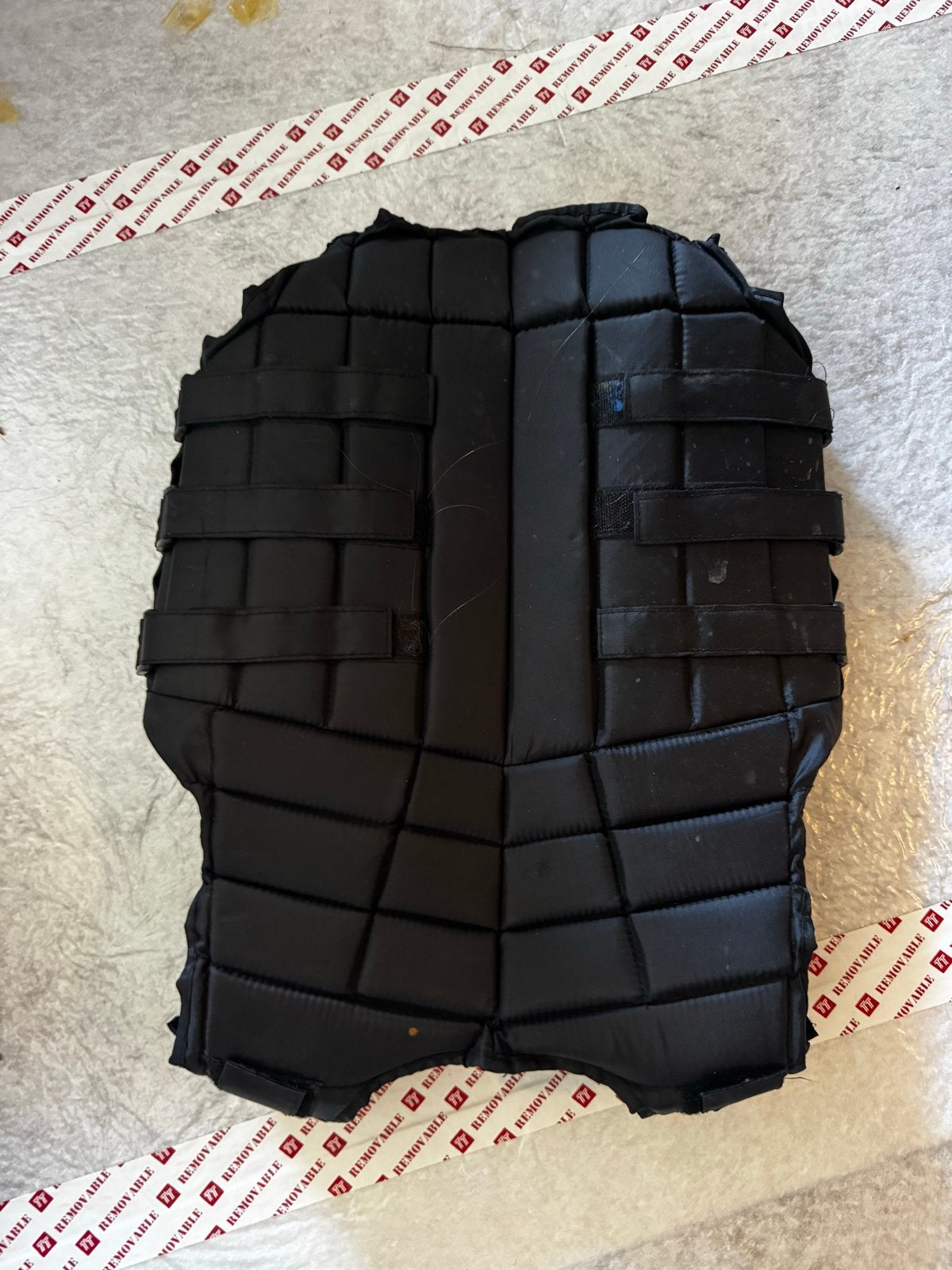 Body protector paardrijden, Ophalen