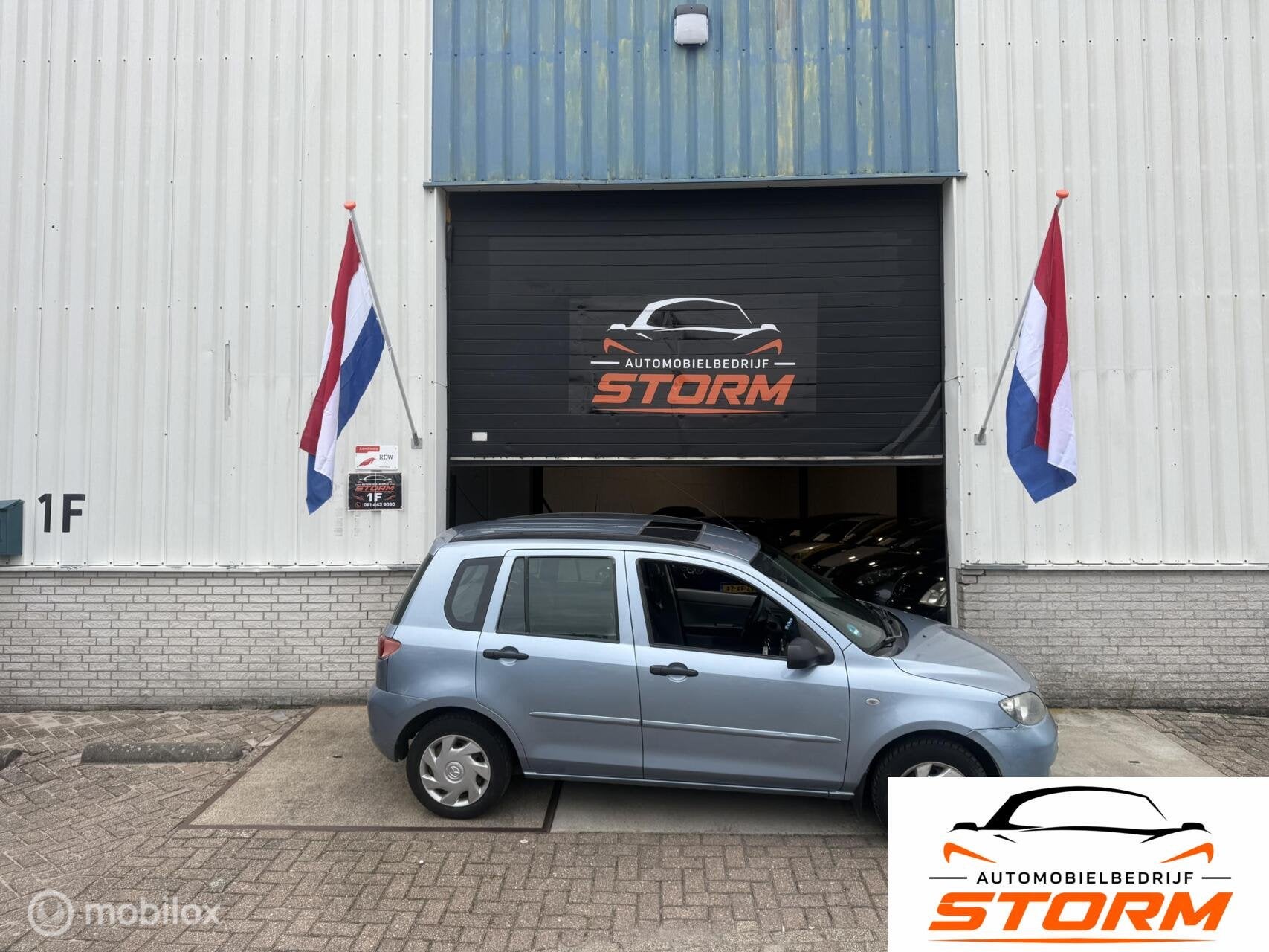 Mazda 2 1.4 Exclusive, Auto's, 15 km/l, 4 cilinders, Blauw, Bedrijf