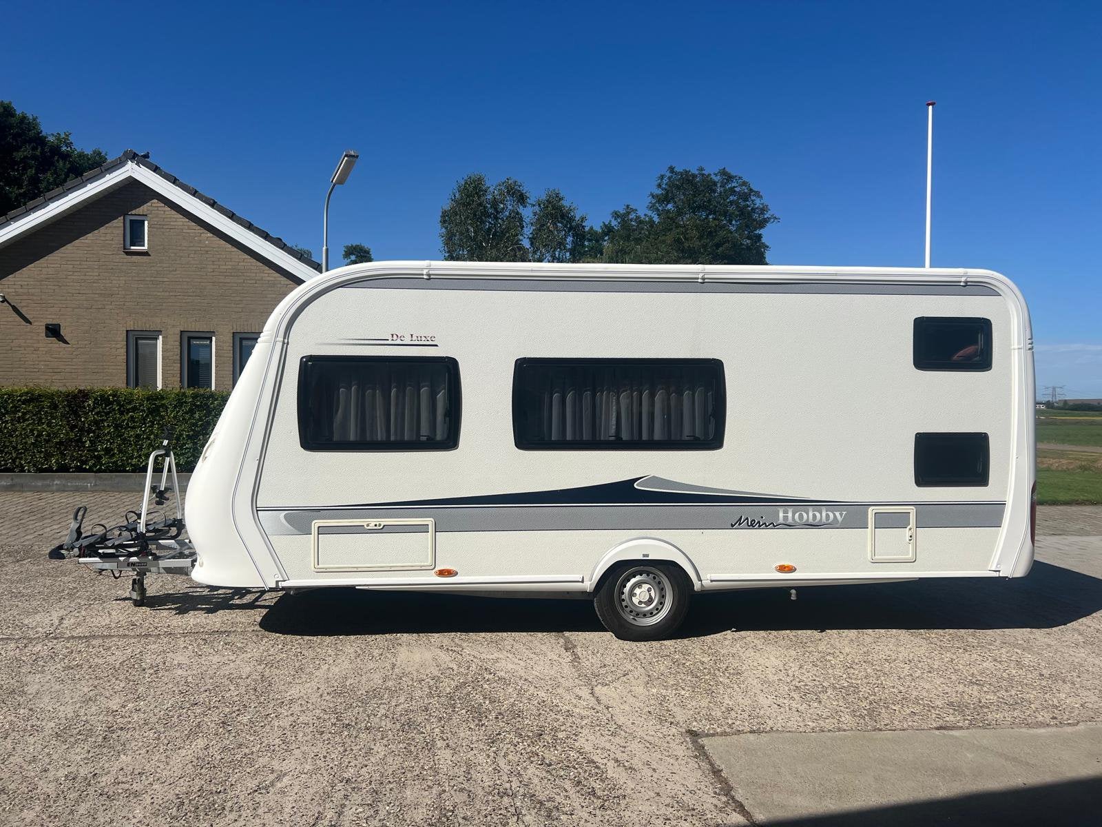 Hobby de luxe  490 KMF met stapelbed, Caravans en Kamperen, Caravans, Ringverwarming, Hobby, Kleine zit, Dwarsbed