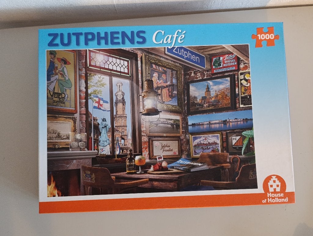 Puzzel stadsgezicht Zutphens café 1000 stukjes, Ophalen of Verzenden, 500 t/m 1500 stukjes, Nieuw, Legpuzzel