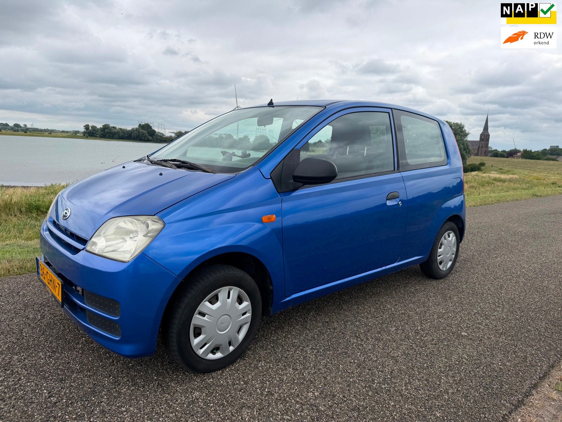Daihatsu Cuore 1.0-12V 100th Anniversary, Auto's, Stof, Zwart, 18 €/maand, Origineel Nederlands