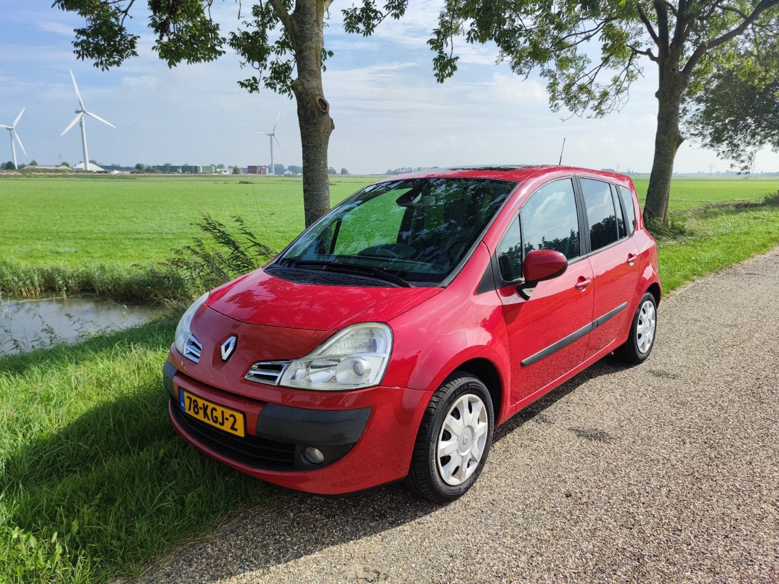 Renault Grand Modus 1.6 16V AUT 2009 Rood, Auto's, 4 cilinders, 1210 kg, Origineel Nederlands, Particulier