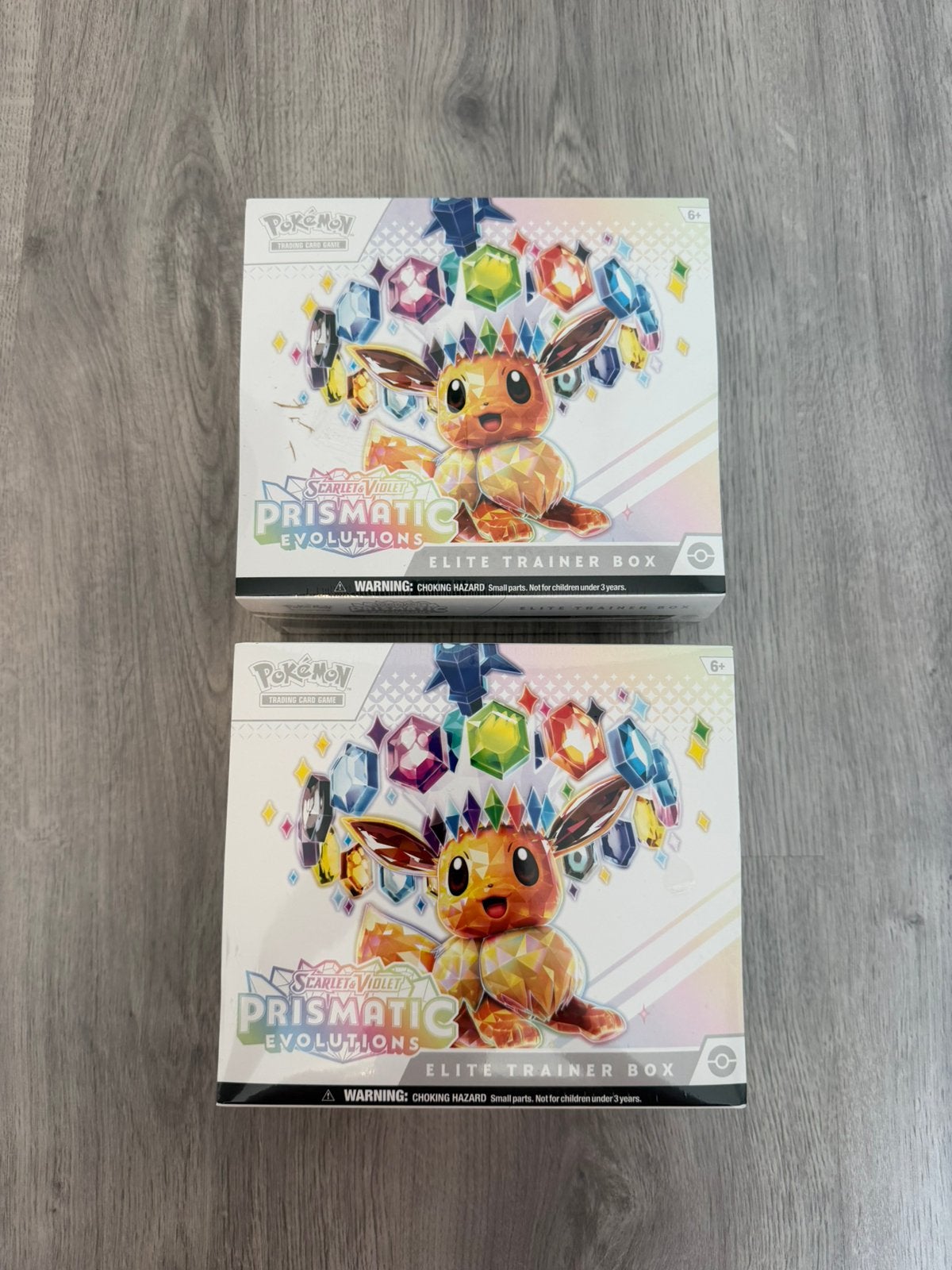 Pokémon Prismatic Evolutions ETB | Goedkoopste Cardmarket NL, Ophalen of Verzenden, Nieuw, Boosterbox, Foil