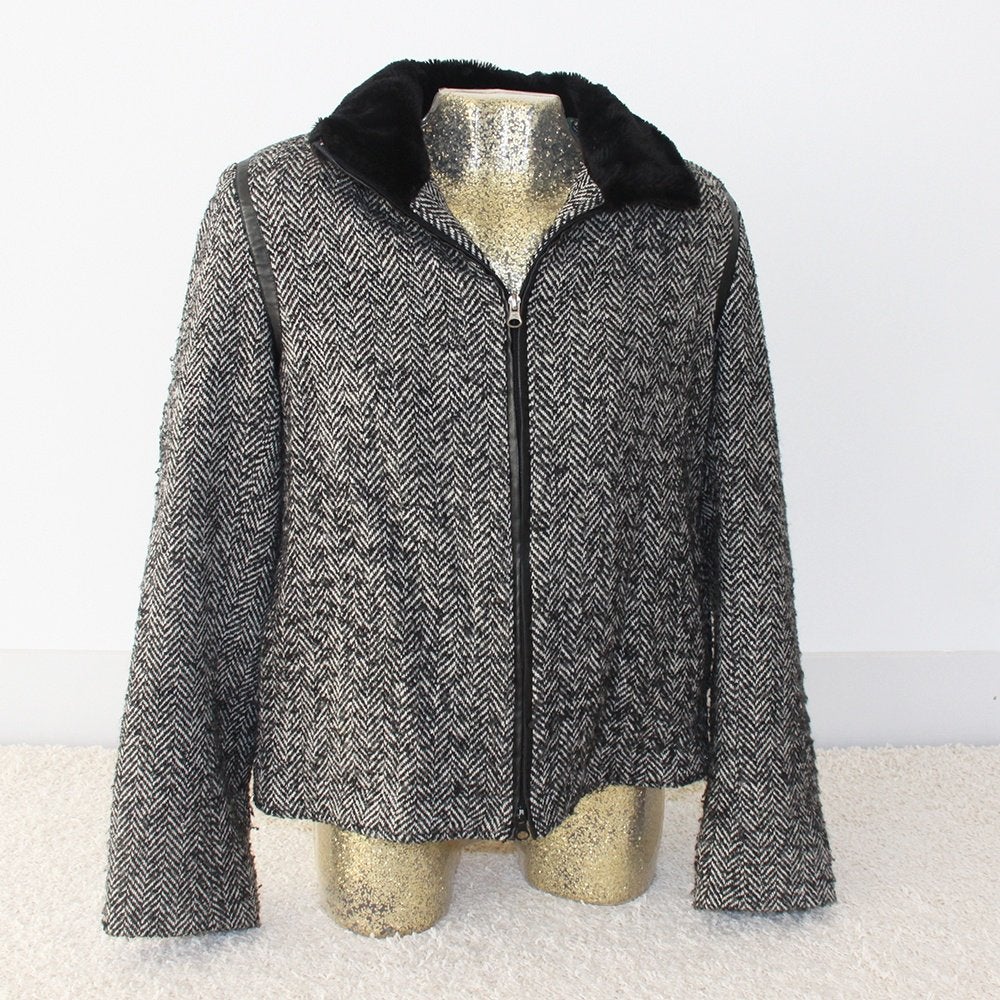 Reset Jas (Maat 42) Tussenjas € 30,-