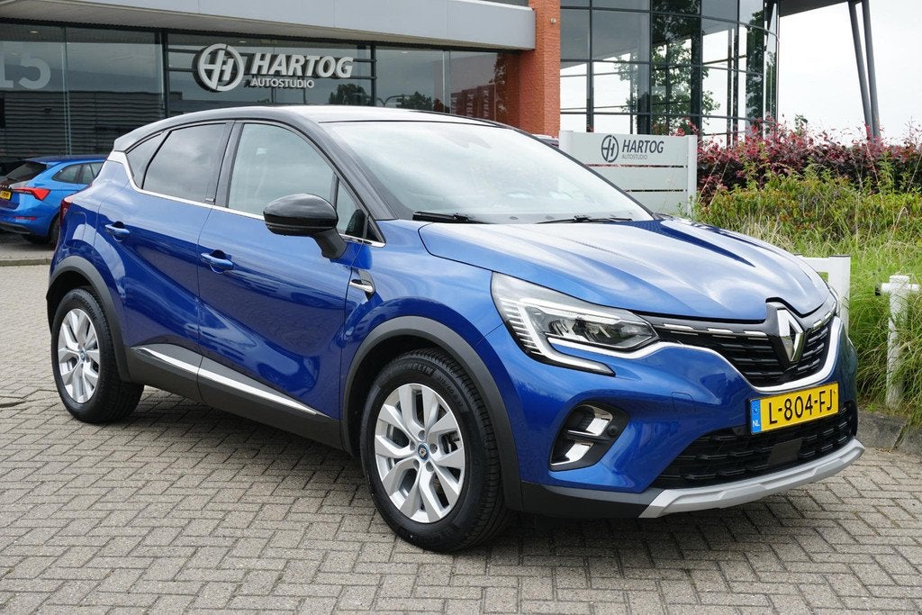 Renault Captur 1.6 E-Tech Plug-in Hybrid 160 Intens *DEALER, Auto's, Stof, Gebruikt, 4 cilinders, Blauw