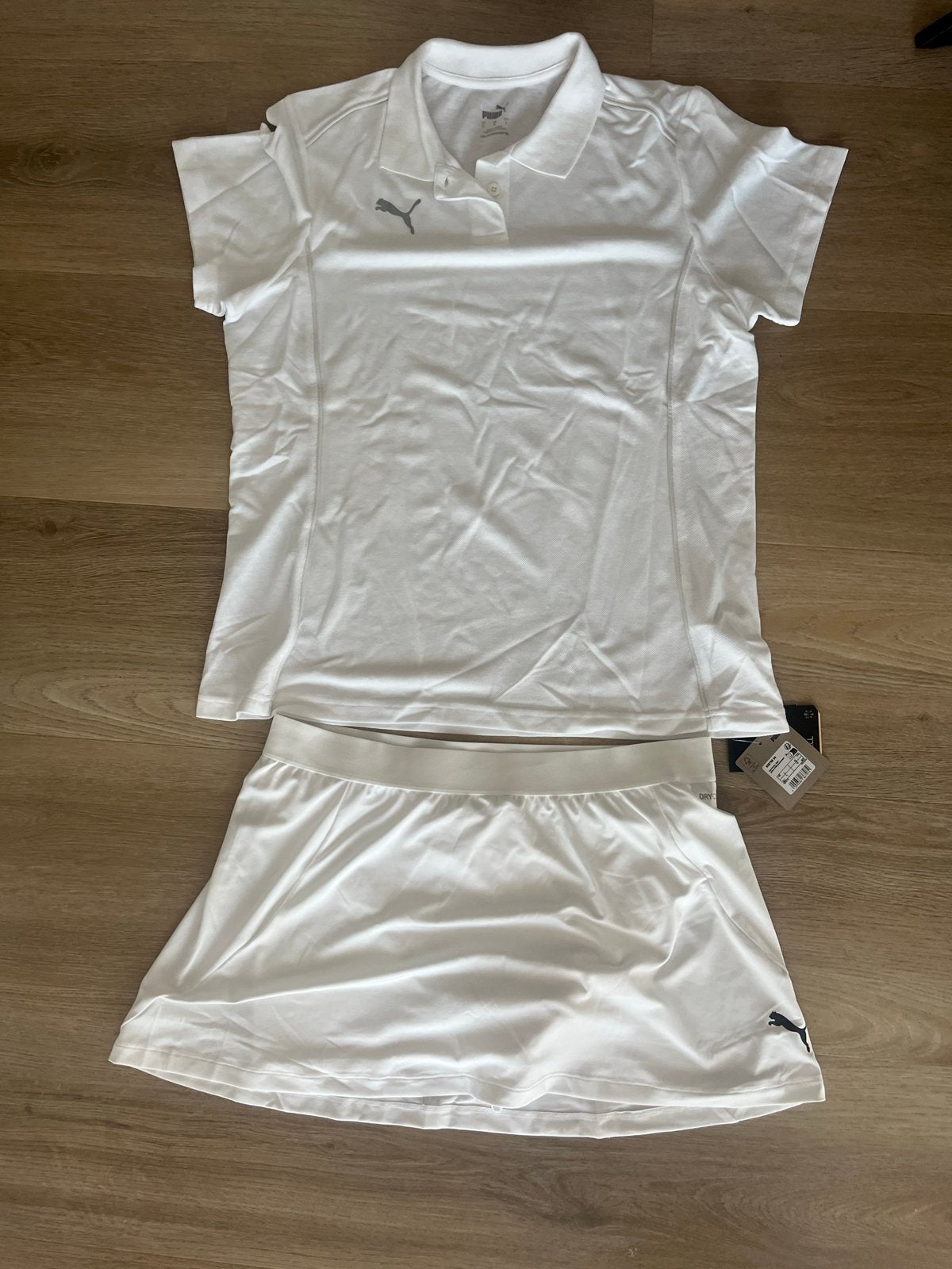 Nieuw Puma sportset: polo en rokje - wit, Kleding | Dames, Sportkleding, Wit, Nieuw, Ophalen of Verzenden, Maat 42/44 (L)