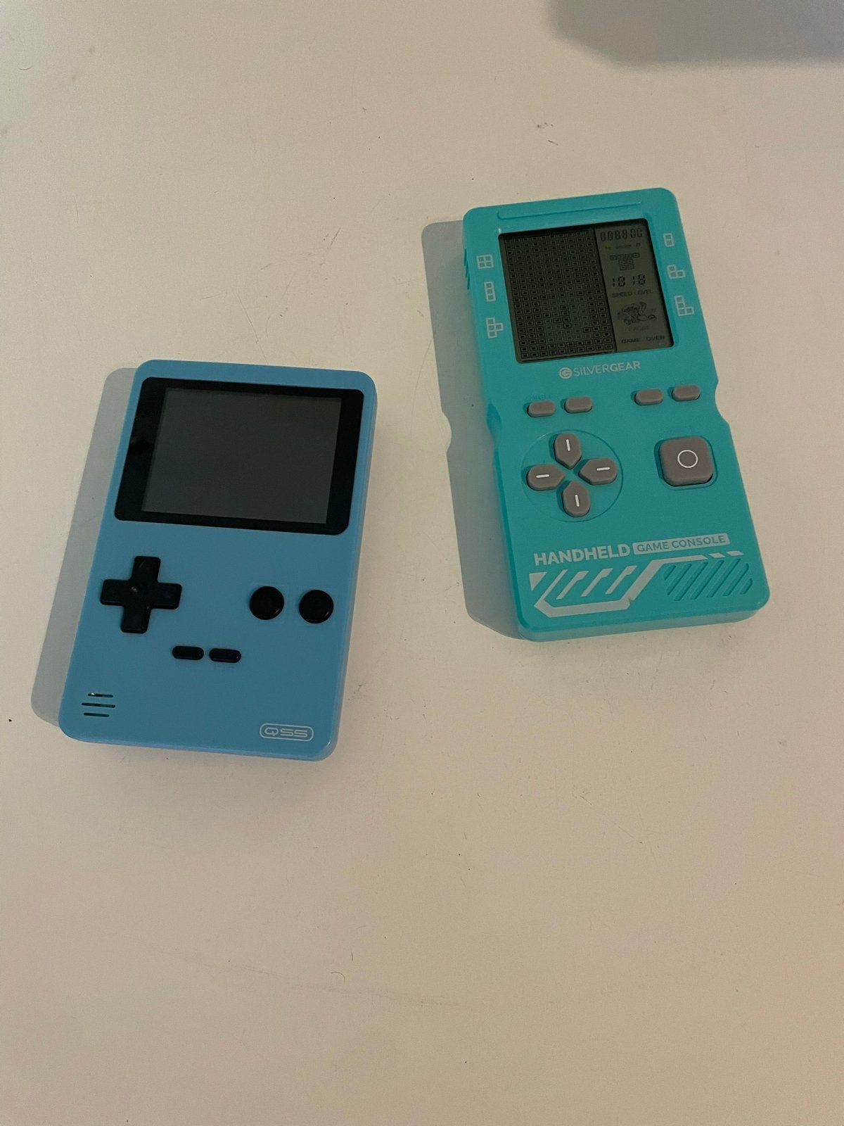 2x Retro Handheld Game Consoles - QSS & Silvergear, Spelcomputers en Games, Ophalen of Verzenden, Overige merken, Zo goed als nieuw