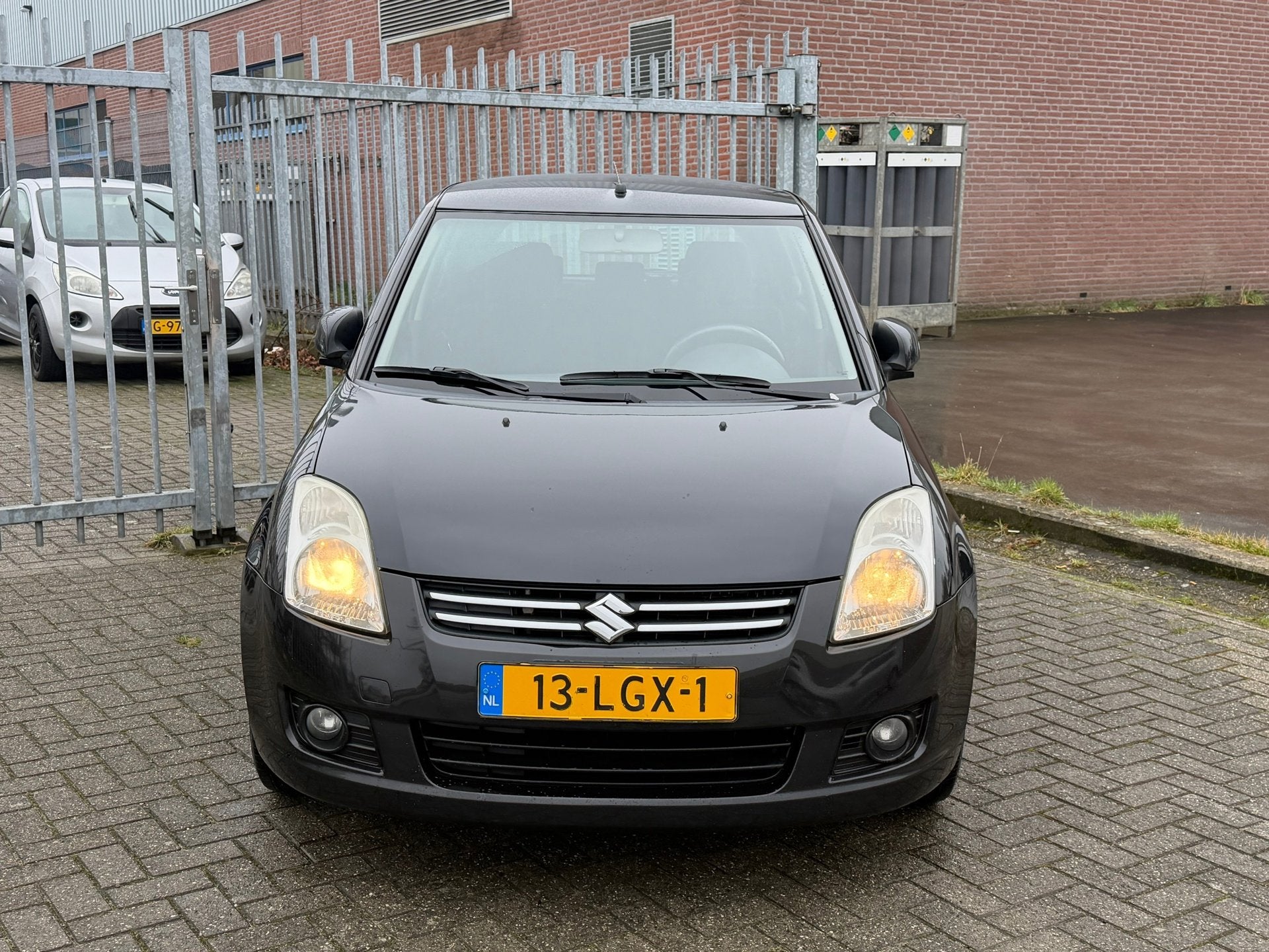 Suzuki Swift 1.3 Limited 5 deurs 93PK! KMST NAP! AIRCO l STO, Auto's, Voorwielaandrijving, Dealer onderhouden, Zwart, 400 kg