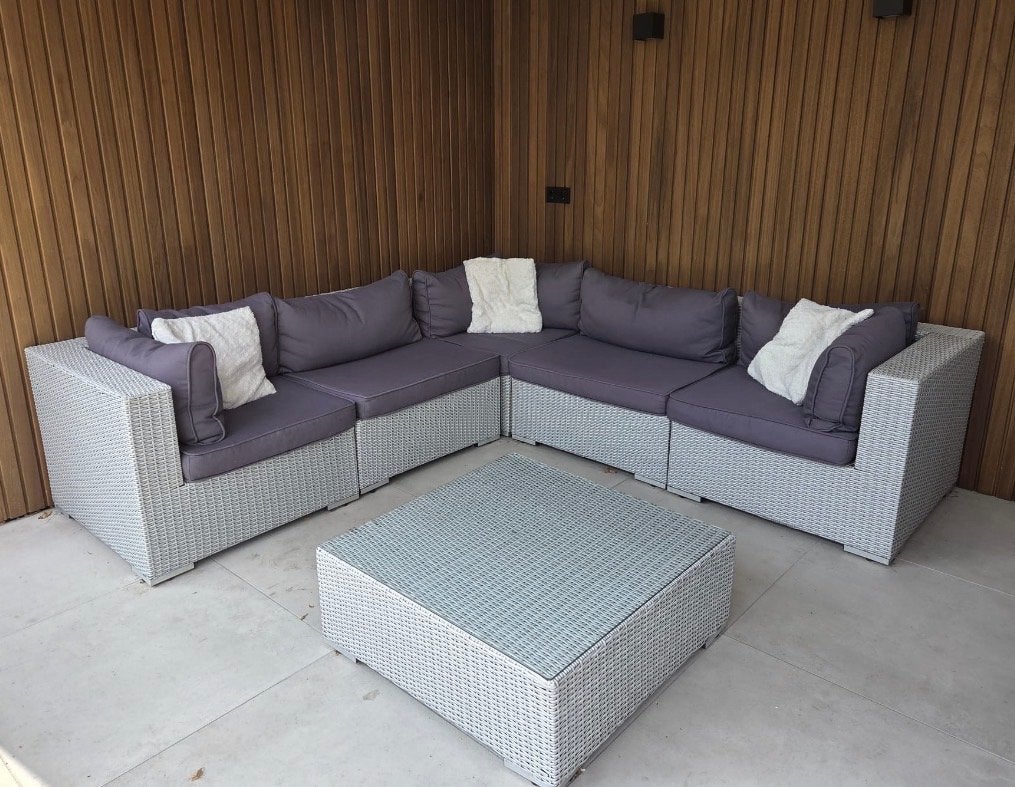 Grijze loungeset met blauw/antraciete kussens
