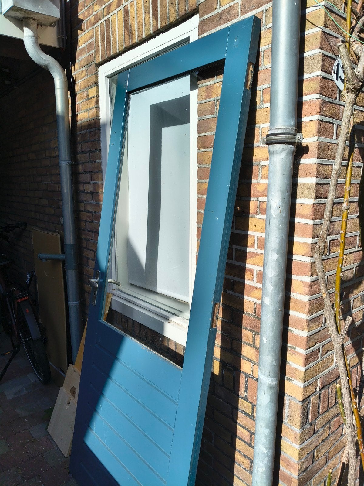Gebruikte schuurdeur met enkel glas en slot - 211x87.5 cm, Doe-het-zelf en Verbouw, Gebruikt, Ophalen of Verzenden, 200 tot 215 cm