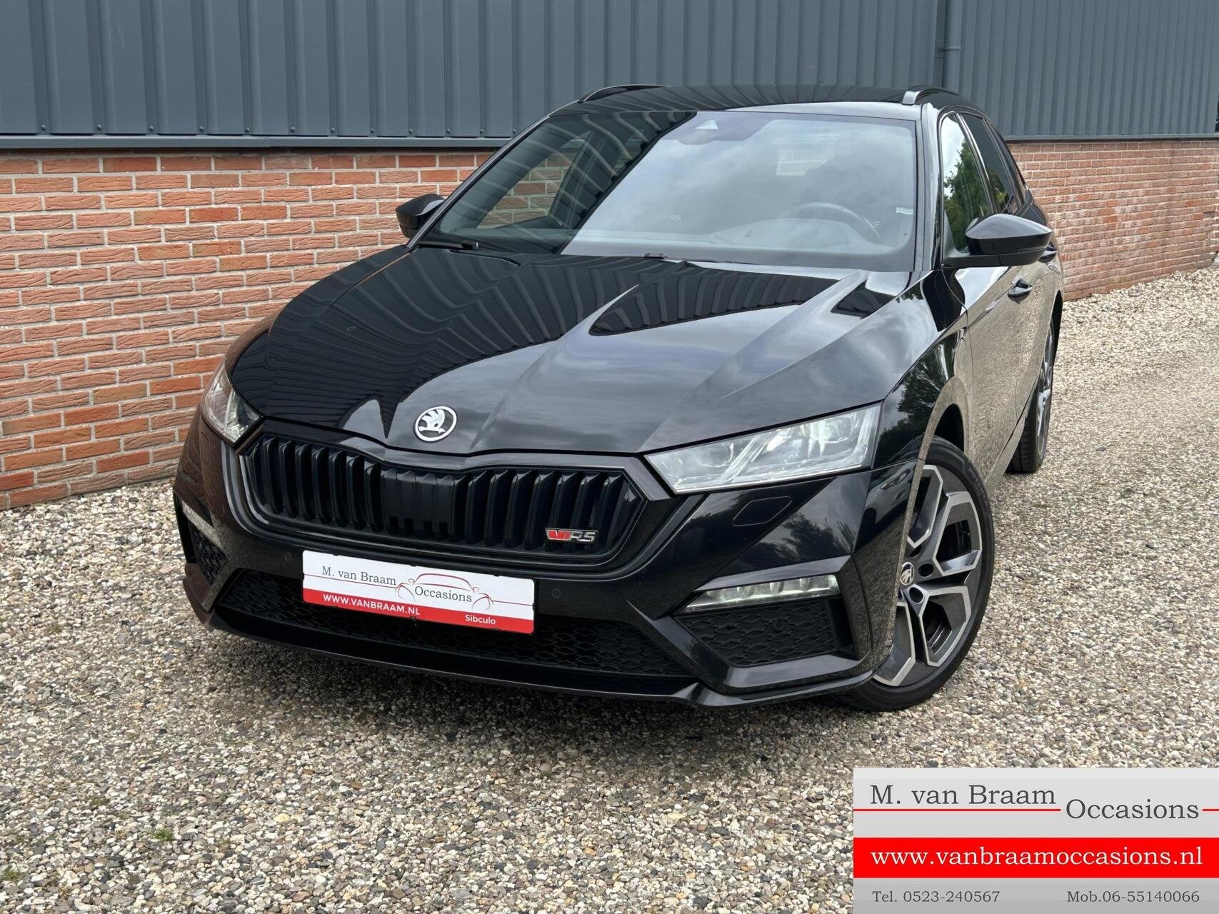 Skoda Octavia Combi 1.4 TSI RS iV PHEV Sportline Business, Auto's, Gebruikt, Euro 6, 4 cilinders, Zwart
