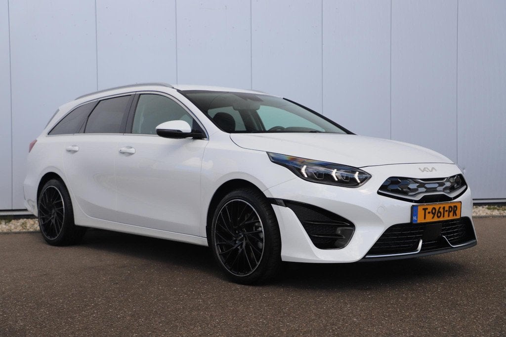 Kia Ceed Sportswagon 1.6 GDI PHEV DynamicPlusLine 18 inch LM, Gebruikt, Met garantie (alle), Leder en Stof, Wit