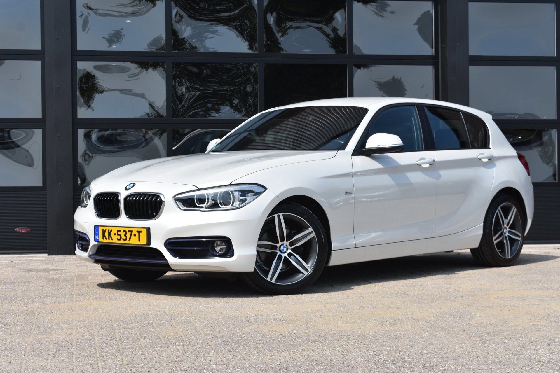 BMW 1-serie 118i Centennial High Executive '16 LED Leder Cli, Auto's, BMW, 1-Serie, Wit, Bedrijf, 19 km/l